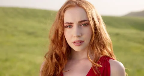 Close up face of attractive red-haired ginger Caucasian woman with wide charming Stock-Footage 243820776