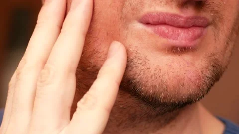 Close-up face of Caucasian man over 40, sad unshaven dissatisfied with his appea Stock Footage 147132214