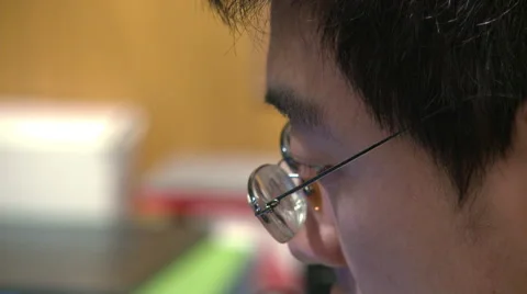 Close-up face of Chinese man working Stock Footage 54251487