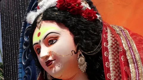 Close up face of a clay idol of Goddess Devi Durga Stock Footage 229725013