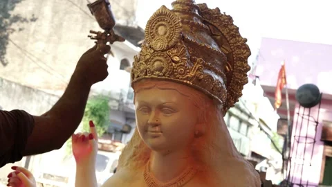 Close up face of a clay idol of Goddess Devi Durga Stock Footage 229726679
