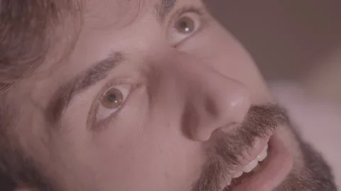 Close up on face of drug addicted young man staring at the ceiling Stock-Footage 197812871