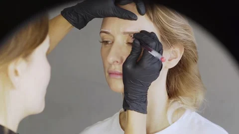 Close-up face eyebrow correction process Stock Footage 168284158