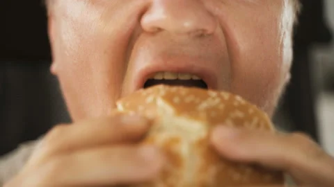 Close Up Face Fat Man Eating Fast Food Chips And Hamburgers Video stock 115209292