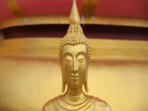 Close-Up Face of Gold Buddha Statue in Thailand Stock-Footage 75635398
