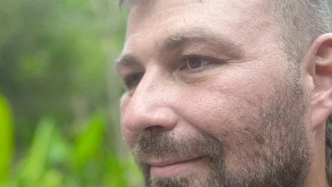 Close up face handsome bearded man looking to camera and smiling. Portrait adult Stock Footage 112139516