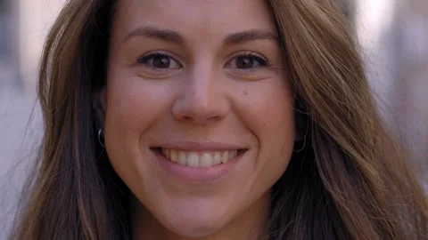 Close up face happy beautiful young European woman happy smiling on street Stock Footage 247963381