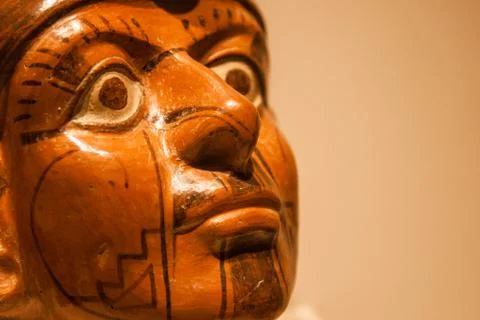 Close up of the face of a Inca statue. Stock Photos