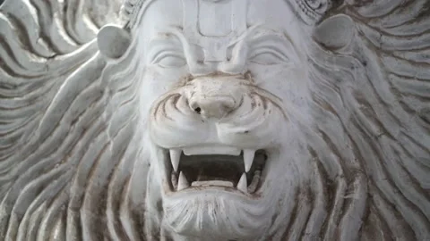 Close up face of a Lion in clay idol of Goddess Devi Durga Stock Footage 229727042