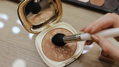 Close-up of face makeup brush in a container with powder. Decorative women's Stock Footage 129458641