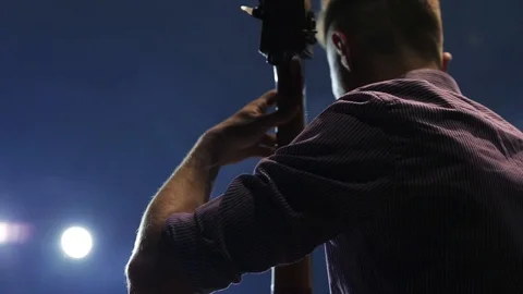 Close up face man playing violoncello on the stage performing art artist cellist Stock-Footage 98216270