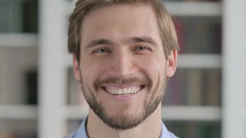 Close up of Face of Man Smiling at the Camera Stock Footage 162325612