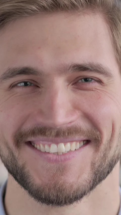 Close up of Face of Man Smiling at the Camera, Vertical Video Video stock 339577586