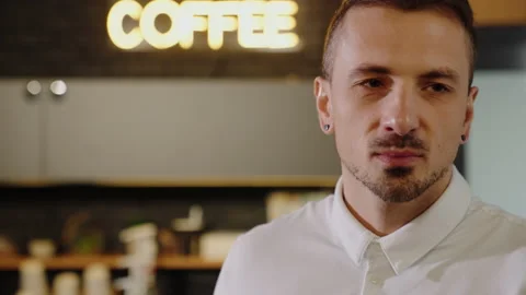 Close-up of the face of a man who is thinking about a project in the office Stock Footage 201921277