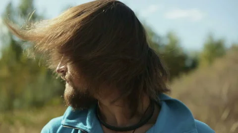 Close-up face of a mountain hiker man in the forest. Video stock 116500348