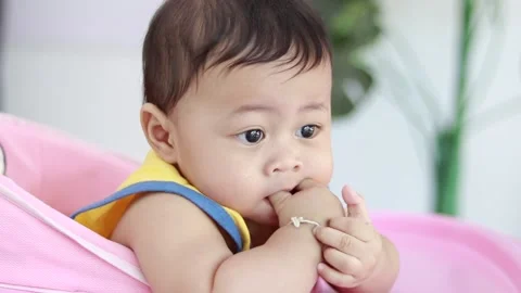 Close-up of the face of a nine-month-old male baby boy. Stock Footage 226121706