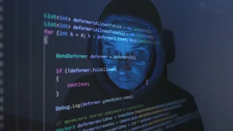 Close-up face of old man wearing glasses, experienced programmer, hooded hack Stock Footage 168484346