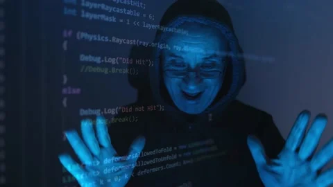 Close-up face of old man wearing glasses, experienced programmer, hooded ha.. Stock Footage 239856125