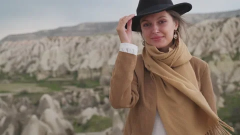 Close-up of a face in the open air portrait of a young female traveler with a Stock Footage 205835770