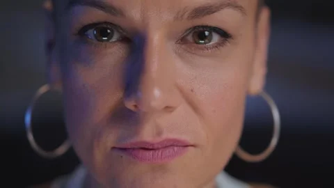 Close up of face path attractive middle aged woman with shaved hair looking Stock Footage 270386488