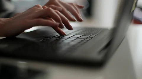 Close-up face of pensive redhead young woman working on laptop computer looking Video stock 194948914
