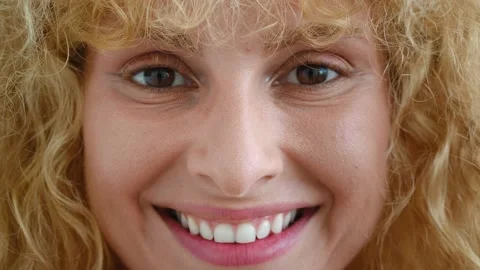 Close-up face portrait of a charming young Caucasian curly red-haired pretty Stock Footage 220873524