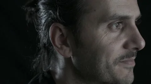 Close up face portrait of long haired young man with brace is smiling to came Stock Footage 134543153