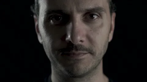 Close up face portrait of young guy with brace is laughing. Teeth problem and Stock Footage 133883076