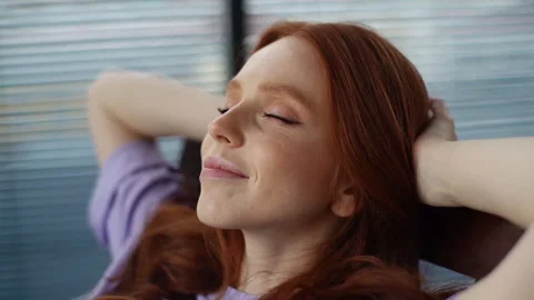 Close-up face of relaxed serene young woman listening music with eyes closed Stock-Footage 155445006