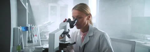 Close up face scientist woman looking un... | Stock Video | Pond5