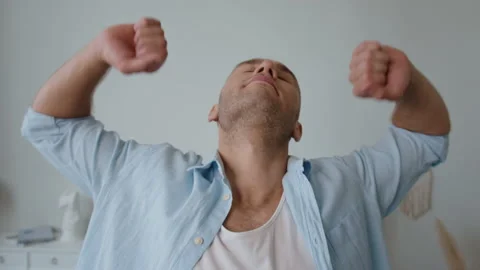 Close up face of wide tired sick caucasian young man staying and falling on the Stock Footage 166421808