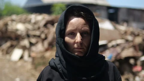 A close-up of the face of a widow in mourning heartbroken from the loss of a Stock Footage 217415094