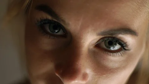 Close up face woman looking to camera. Portrait sad woman. Female face, eyes Stock Footage 103192387