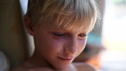 Close up face of young kid with real emotions. Stock Footage 137673613
