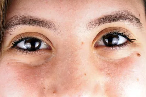 Close up of the face of a young lady Stock Photos