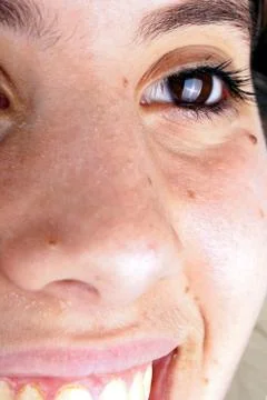 Close up of the face of a young lady Stock Photos