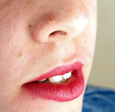 Close up of the face of a young lady Stock Photos