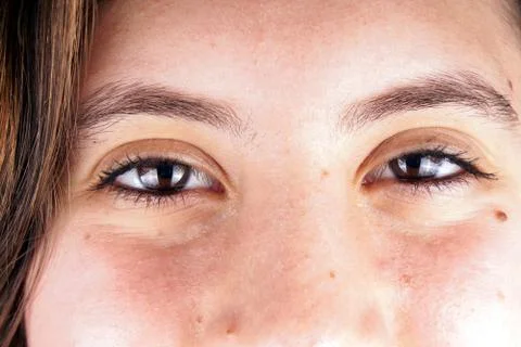 Close up of the face of a young lady Stock Photos