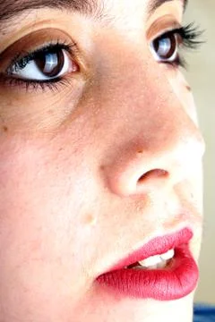 Close up of the face of a young lady Stock Photos