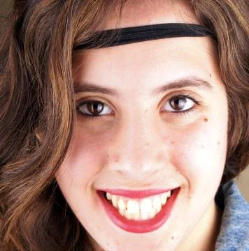 Close up of the face of a young lady Stock Photos