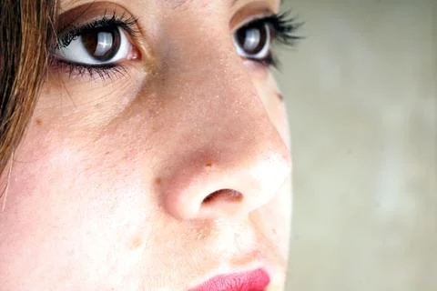 Close up of the face of a young lady Stock Photos