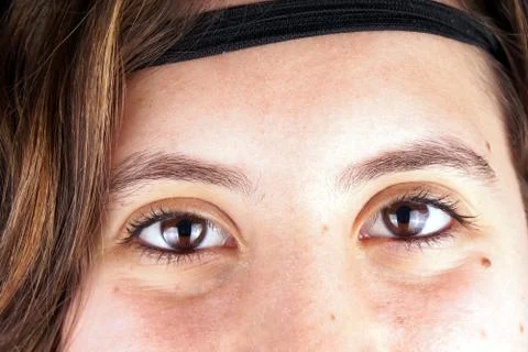 Close up of the face of a young lady Stock Photos