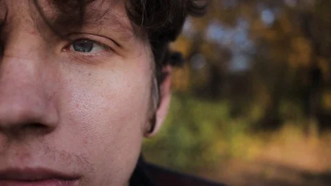 Close-up face of a young man. Video stock 125090819