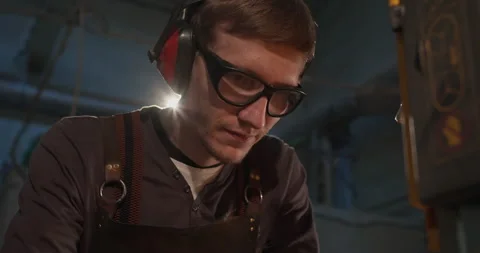 Close-up face of a young master at work Stock-Footage 144606786