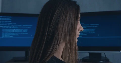 Close up face of Young Woman at binary code background Video stock 102215385