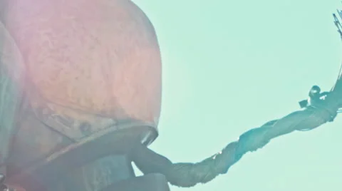 Close up faces and hands of a metal motorcycle sculpture with a beautiful bokeh Stock Footage 68604292