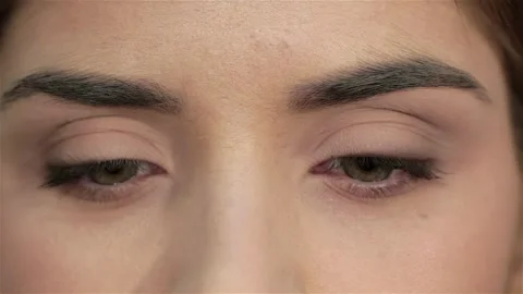 Close up faces - girl opens her eyes Stock Footage 252673337