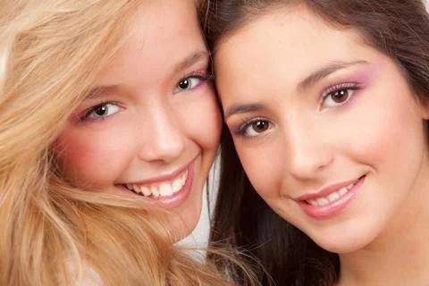 Close up faces with perfect white teeth Stock Photos