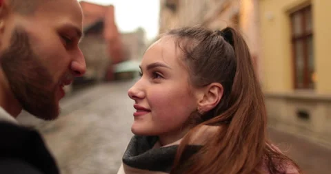 Close-up of the faces of a young couple in love kissing Stock Footage 247187125