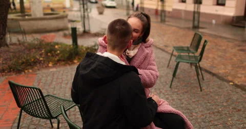 Close-up of the faces of a young couple in love kissing Stock-Footage 247189361
